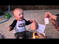 Baby Laughing at Ripping Paper (Falls Backwards)