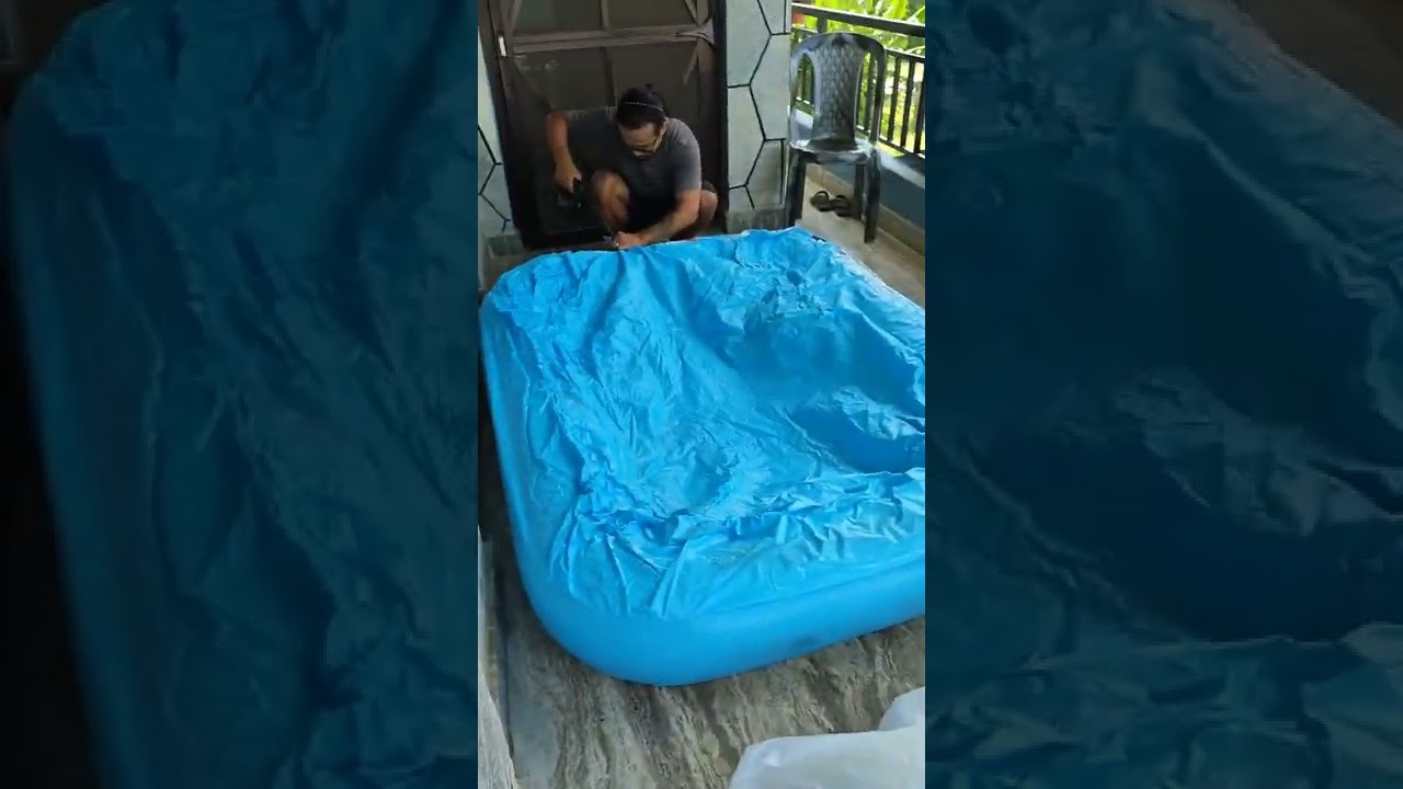 blowing 🌬️up pool for my kid 