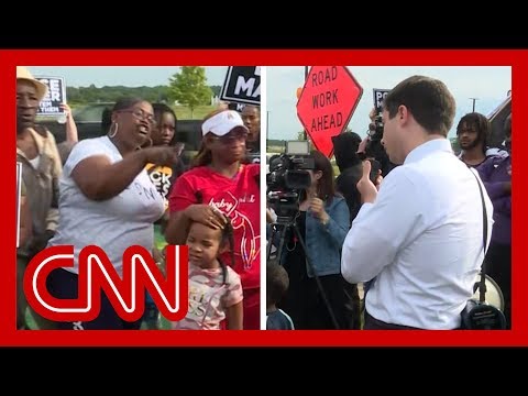 Angry protesters confront Mayor Pete Buttigieg