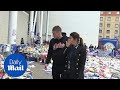 Rebekah and Jamie Vardy weep as they visit Leicester City memorial