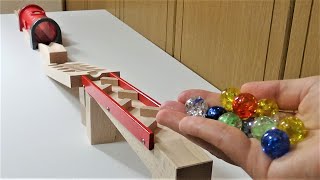 Marble run wooden tunnel healing video of glittering balls.ASMR