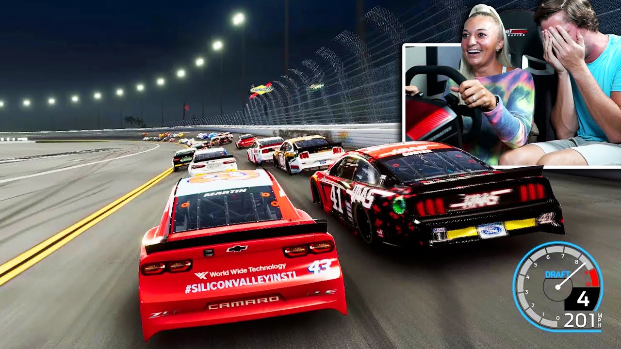 Girlfriend tries NASCAR racing simulator..