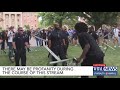 Officer slaps at protesters megaphone during uncchapel hill protest