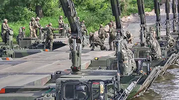 Troops Build Pontoon Bridge To Move Tanks Across River During NATO Drills In Lithuania