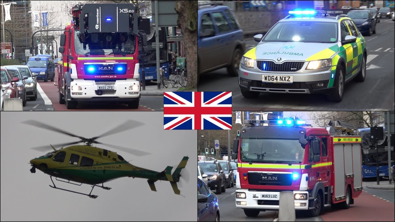 Fire engines, ladder truck and ambulances responding with siren and ...