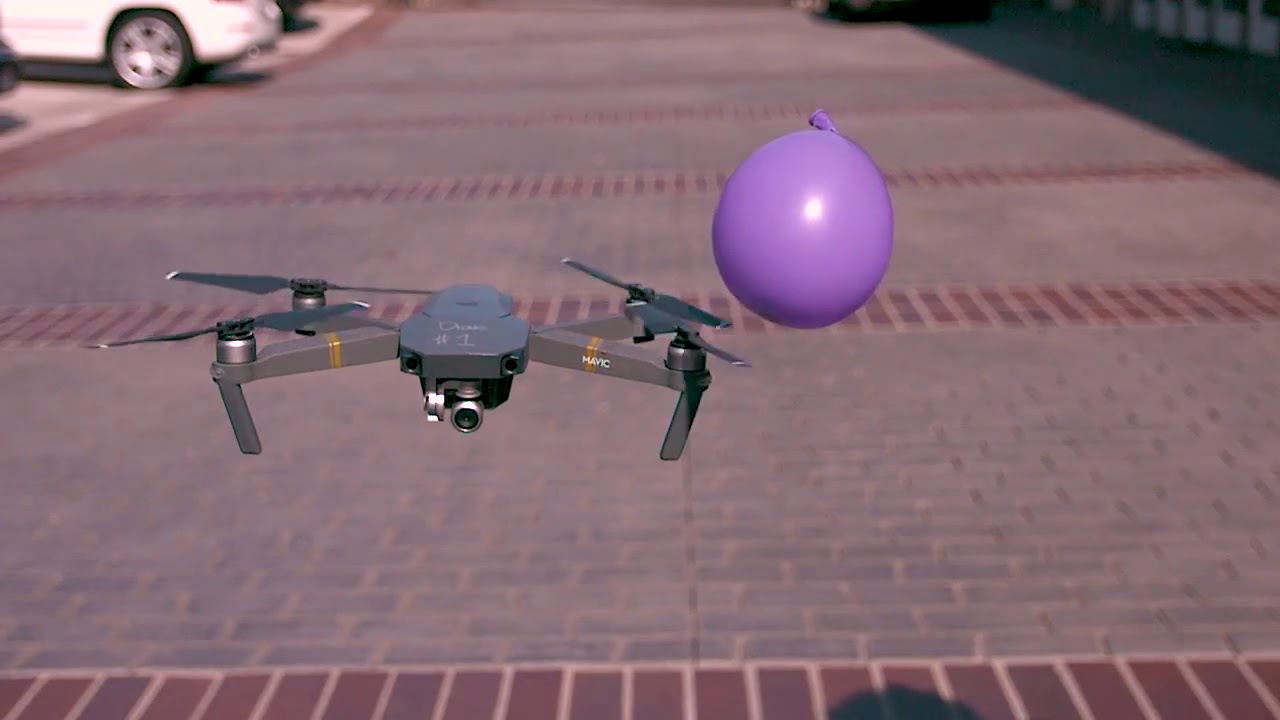 Drone vs water balloon slow motion video YouTube