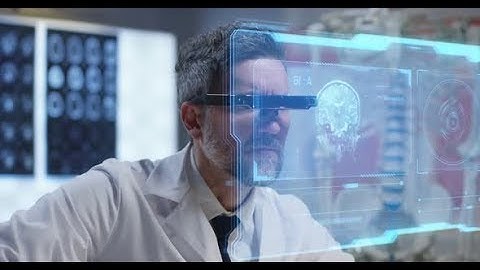 Doctor Using Holographic Display for Research | Stock Footage - Videohive