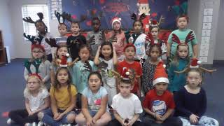 Ms. Johnson's 2nd grade class singing We Wish You A Merry Christmas