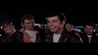 Escena grease Dany despercia a Sandy
