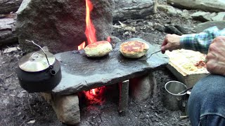 Primitive Cooking Stuffed Bannock On A Stone