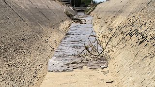 Flash floods add misery to drought-stricken West