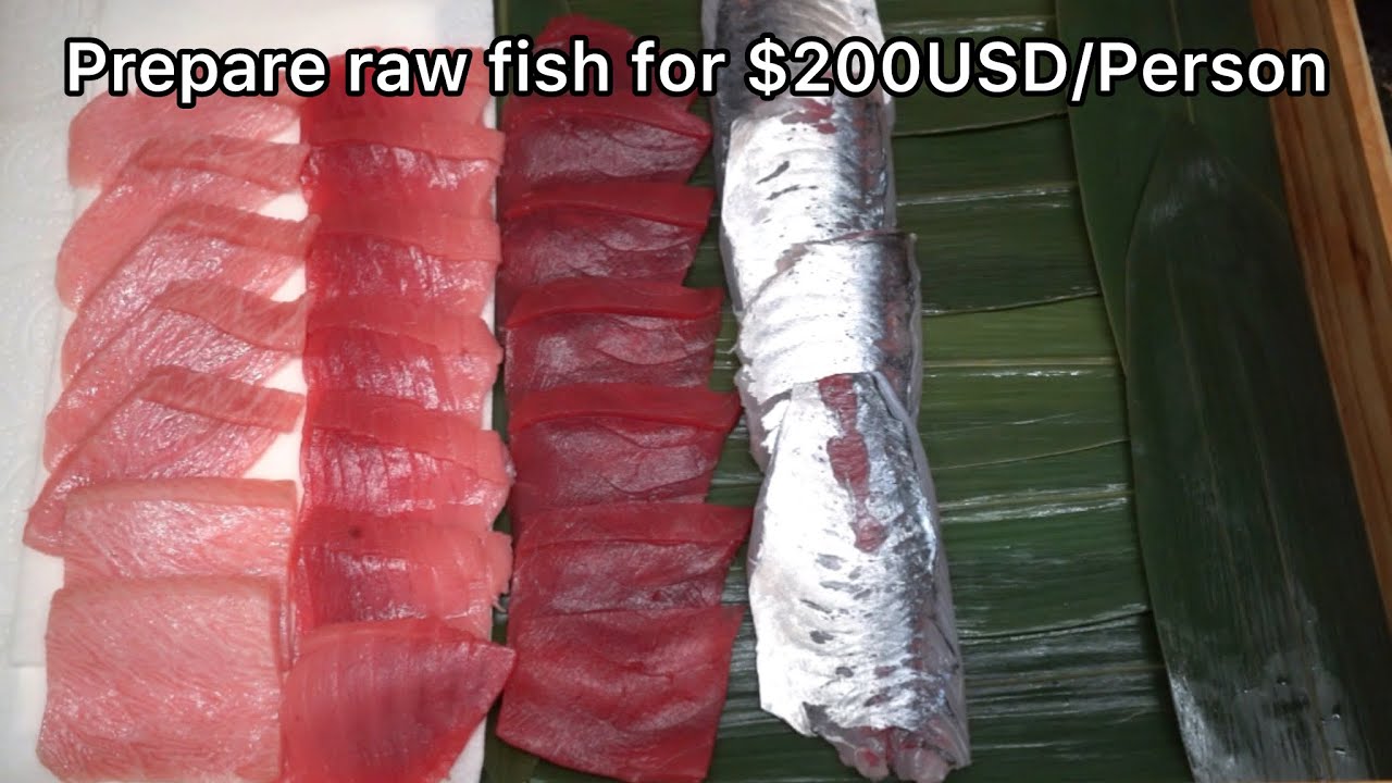 Cutting raw fish for sushi omakase $200USD/1Person
