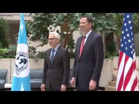 FBI Director James Comey visits INTERPOL