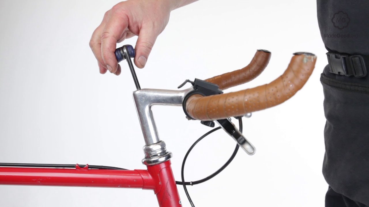 スレッド付きステアリングに取り付けられた自転車のハンドルバーを調整