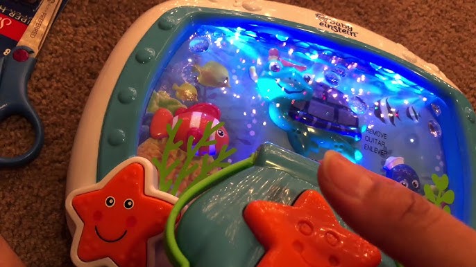 Baby Einstein Sea Dreams Soother (My son's first reaction to it) 