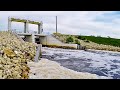 EPIC Battle with a GIANT BASS in Rushing Water (Spillway Dam Fishing)