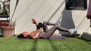 Dead bug with foam roller and leg extensions