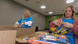 LG&E employees fill 2,000 backpacks with school supplies for JCPS students