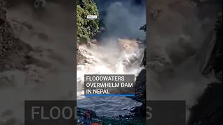 Floodwaters overwhelm dam in Nepal | #RTENews #nepal