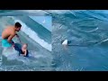 WATCH: Off-duty officer jumps in to save boy from ‘dangerously close’ shark  at Florida