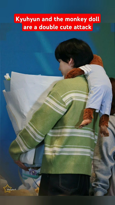 Kyuhyun and the monkey doll are a double cute attack lol