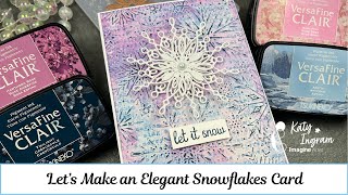 Let’s Make an Elegant Snowflakes Card
Hello Friends! Katy here with another holiday video using VersaFine Clair inks to create a beautiful mixed media looking snowflake card. Video has all the details. Thanks for watching.
Art Supplies
Imagine Products
VersaFine Clair https://www.imaginecrafts.com/versafine-clair
Baby Pink
Hawthorn Rose
Arctic
Twilight
On Point Glue https://www.imaginecrafts.com/on-point-glue/no-view/2283
Double Sided Adhesive
Other Products Used
Isopropyl Alcohol
Hero Arts Stacking Snowflakes
Honey Bee stamps Snowflake 3d Embossing folder
White Cardstock
Hot Pressed Watercolor paper
Stamp positioner tool
Foam Tape
Snowflake Dies
Simon Says Stamp White Christmas Background Stamp
Follow Me Here 👇🏻👇🏻👇🏻👇🏻👇🏻👇🏻👇🏻
Eastwicks Paper and Ink Facebook Group:
https://www.facebook.com/groups/526412645275067/?ref=share_group_link
FB: https://www.facebook.com/eastwickspaper
IG: https://www.instagram.com/eastwickspaperandink/
Blog: https://www.eastwickspaperandink.com/
Pinterest: https://www.pinterest.com/eastwickspaperandink
YT: https://www.youtube.com/c/eastwickspaperandink Let’s Make an Elegant Snowflakes Card
