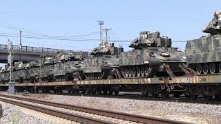 Military Train with Tanks, M1 Abrams, Bradley's (BFV), support vehicles, and more -Drone views-