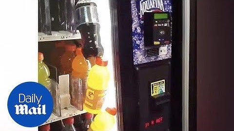 Unlucky guy gets three bottles stuck in vending machine