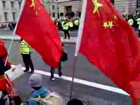 (Chinese student spread news) After been divided into many small groups, brave Chinese students shouted out 'Long live China!' On the other side of the street(Whitehall), stands the riots and mercenary army of Dalai Lama, who knows nothing about China, about Tibet (Xizang Zang Autonomous Region), or even where Tibet is! All they know is pointing their middle finger to other people and throw rabbish to Chinese students. This is the reason for so many policemen are on the other side of the street, and over 30 people were arrested. None of the Chinese was arrested one that day. UK was, is and will always be a good destiny of thousands of Chinese students studying in and experiencing western life style. Special thanks goes to many British citizen and London policemen who supported and took care of Chinese student on Beijing Olympic relay in London! 1.3 billion Chinese people thank you from the bottom of our hearts!