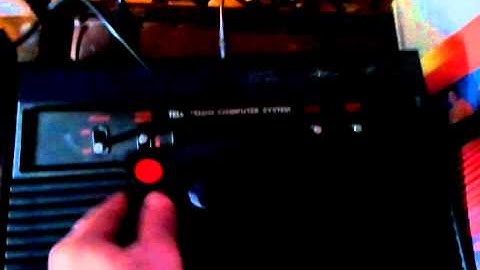 Atari 2600 replica video game console with 64 exciting games