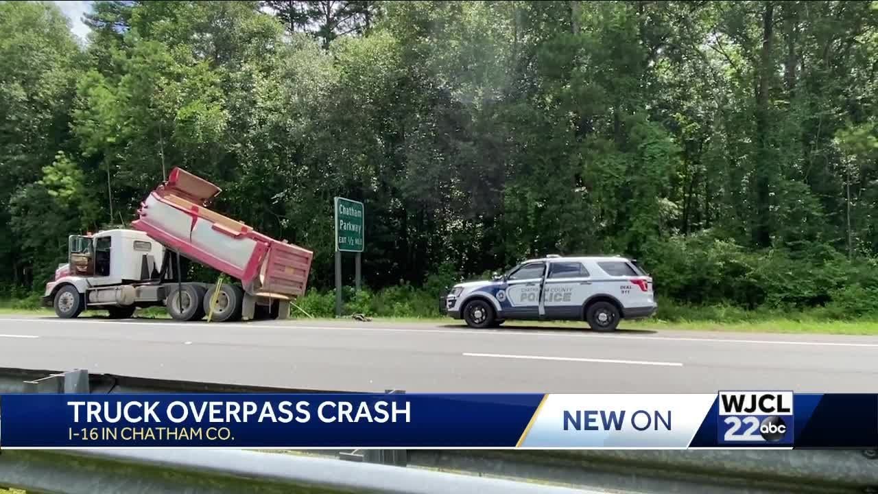 Dump Truck with its Bed Up Strikes Overpass on Veterans Parkway - YouTube