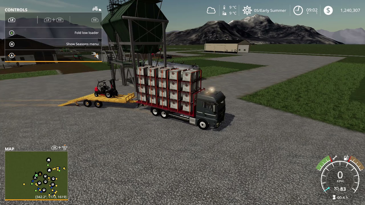 unloading the truck load of pig food to the new feed station