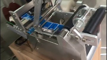 Testing video Semi automatic bottle Labeling machine model YX-L60T with coding function slug 2*3mm