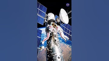 Astronaut performing spacewalk new cylindrical module. #astronaut #EVA #spacestation #shorttrending