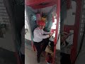 Home salesman trying to operate a construction elevator in China