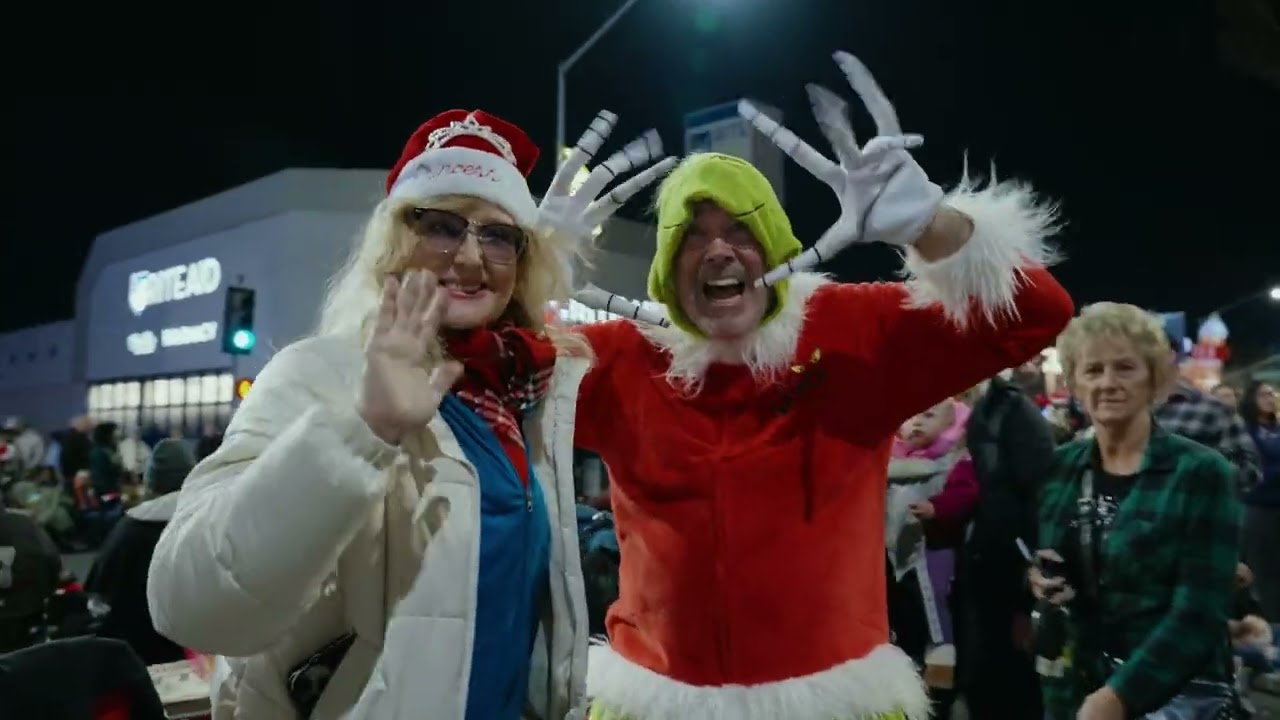 Costumed participants greeting the crowd at the 2024 Belmont Shore Christmas Parade