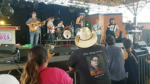 Alejandro Deleon playing bajo with Eddie Gonzalez ...