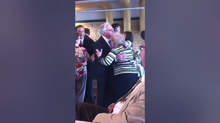 Jean and Bill Ewing dance a slow song