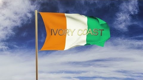 4K Ivory Coast flag with title waving in the wind. Looping sun rises style. Animation loop Stock