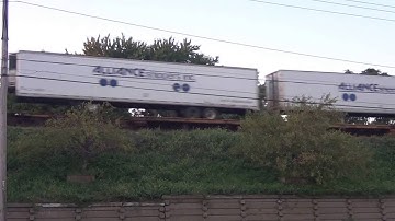 Long CSX Double Stack Train on Overhead Tracks