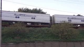 Long CSX Double Stack Train on Overhead Tracks