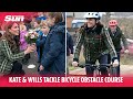 Kate &amp; Wills cheered as they tackle bicycle obstacle course in Moray