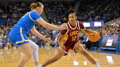 JuJu Watkins leads No. 7 USC to a 72-70 victory over fourth-ranked UConn and Paige Bueckers.