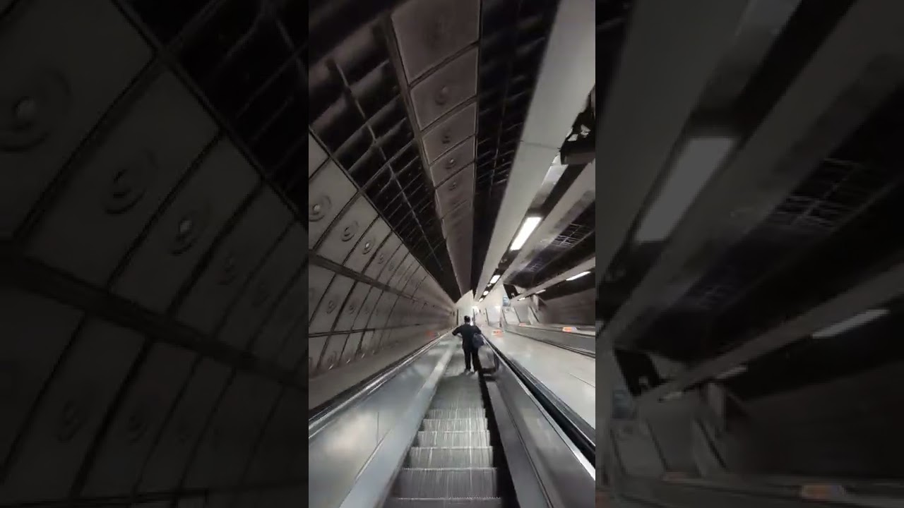 Waterloo Station, going down the escalator. Sunday 17th Oct 2022 @ 23:30