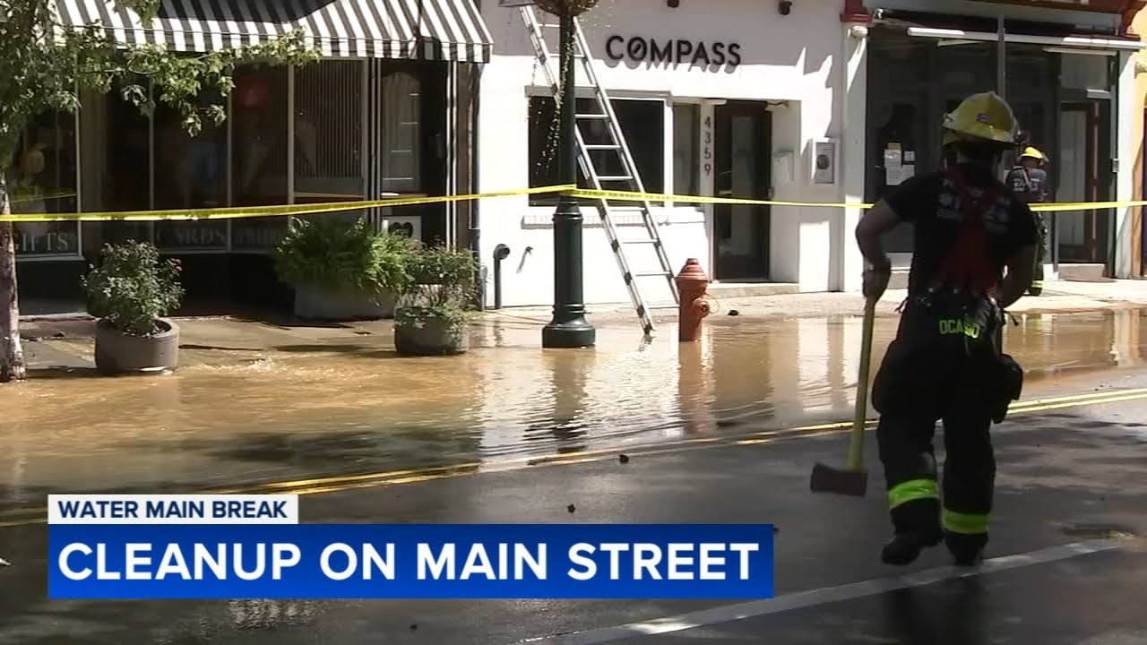 Water main break floods Manayunk businesses, closes Main Street - YouTube