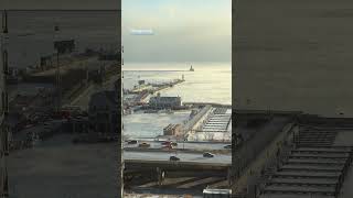 Steam emits from Chicago River and Lake Michigan during extreme cold