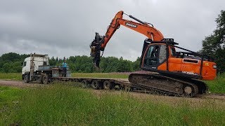 Перевозка техники на трале за тягачом МАЗ. Doosan, ЧТЗ, Ponsse.