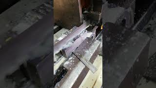 Cutting Impact Specimens On Band Saw Prior V-Notch Charpy Test In Metallurgical Testing Laboratory