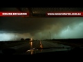 Rain wrapped weak "possible" tornado hits Brownfield, Texas