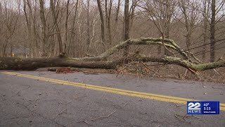 Cold front drives gusty winds, power outages reported